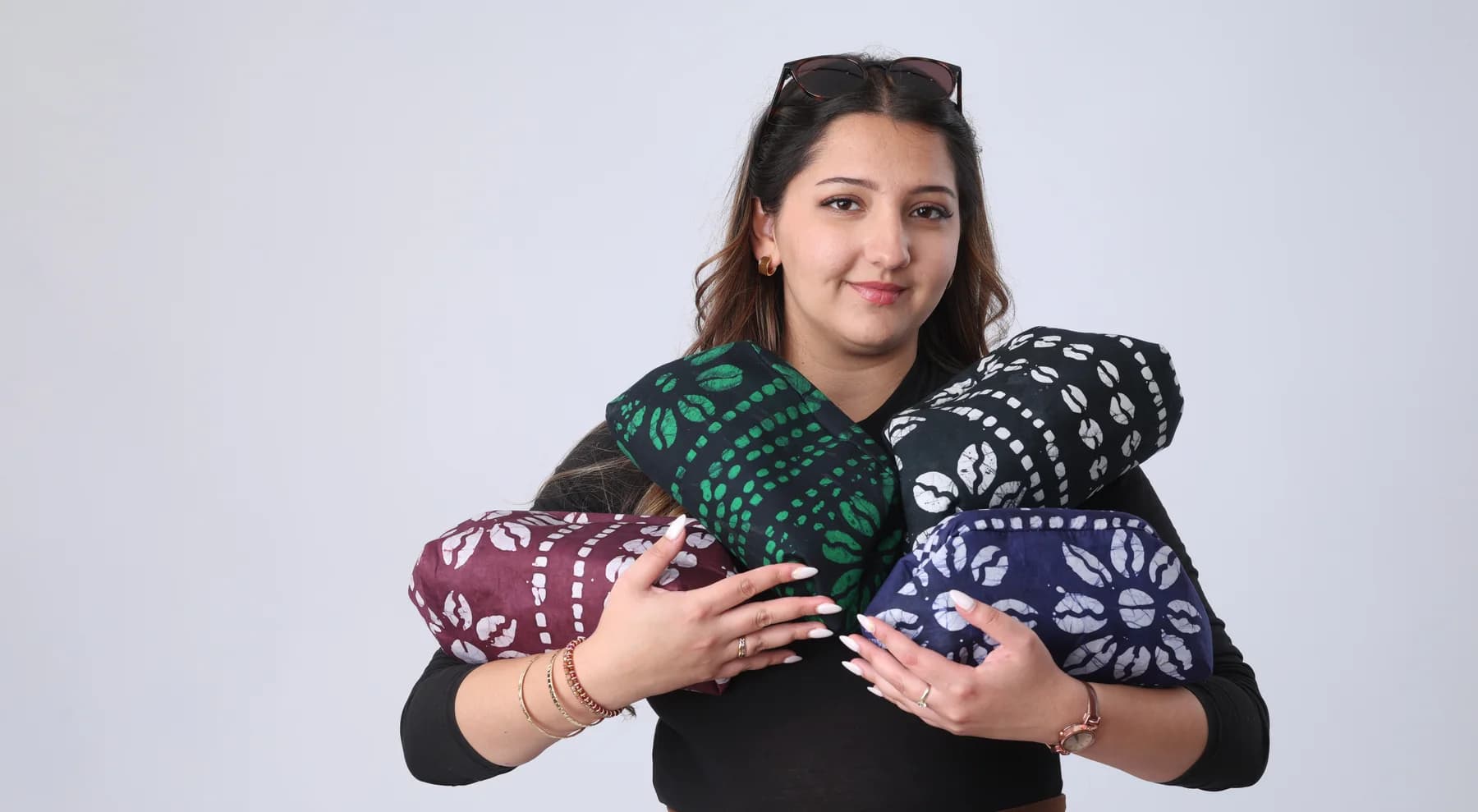 Hand-dyed clutch purses in indigo, green and burgundy